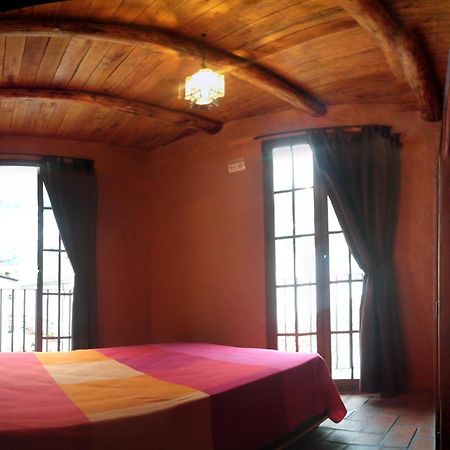 Jade Hotel Ubrique Cameră foto
